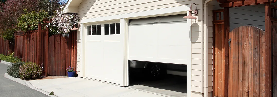 Fix Metal Garage Door Jerking in Wheeling, Illinois